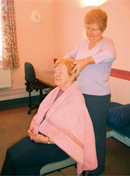 Senior Nurse Hilary Andrews giving a head massage